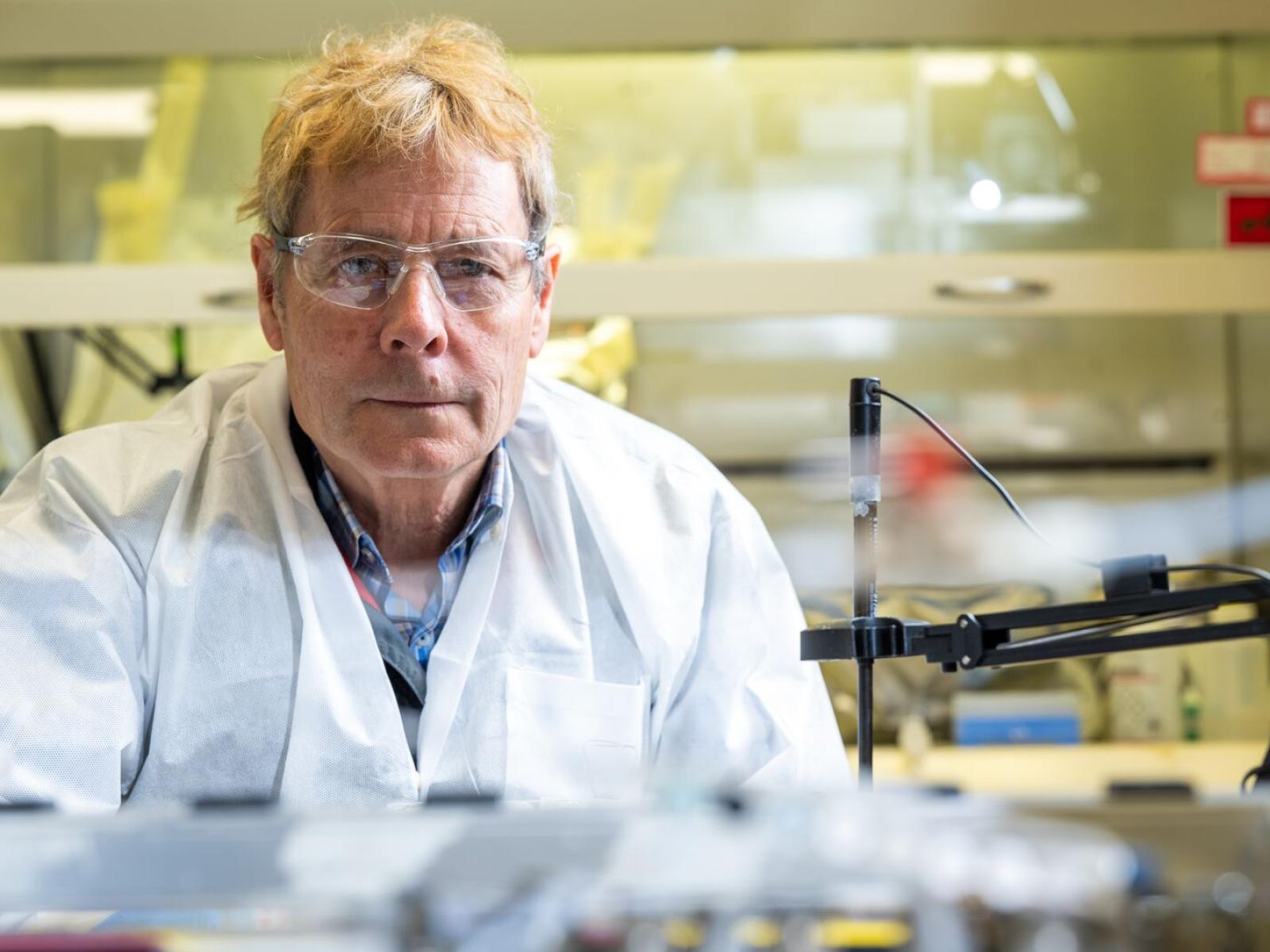 PNNL researcher Jim Szecsody works in the lab to unravel subsurface contamination.