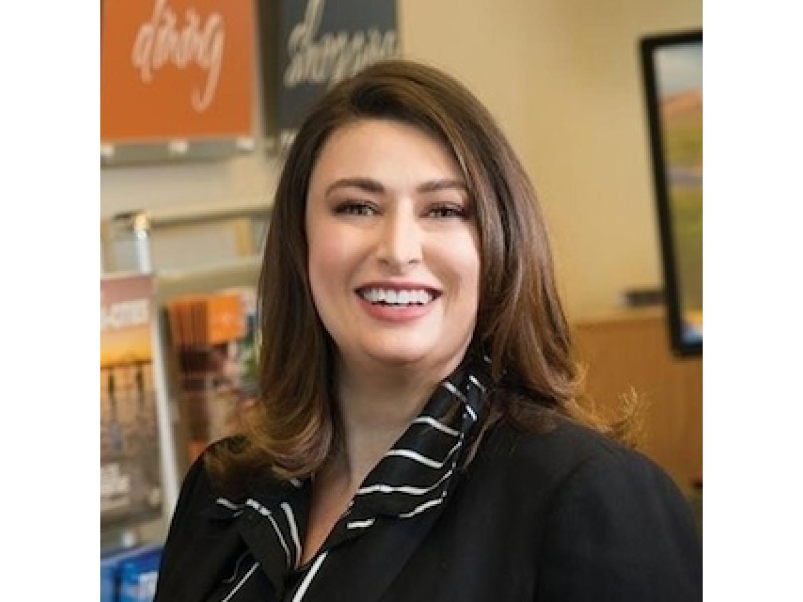 Woman with brown and black jacket