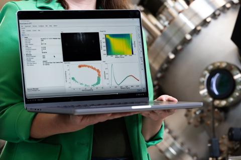 person holding a computer