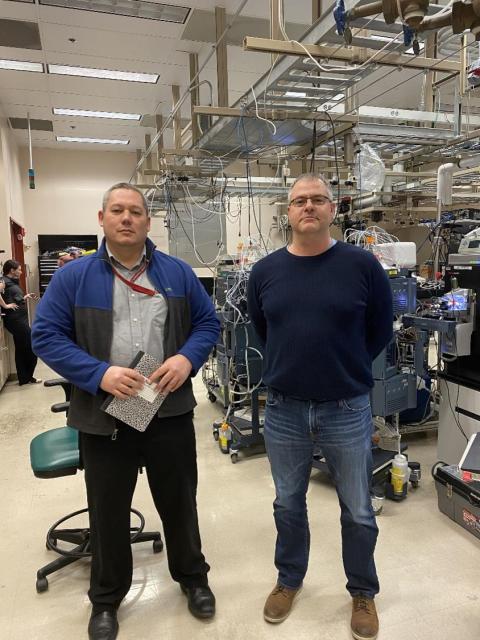 Dr. Cabalo and Tom Metz pose for a photo during a laboratory tour