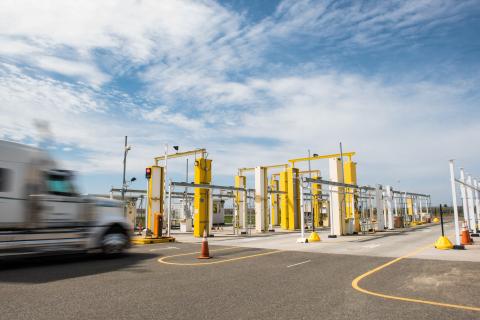 Image of a Radiation Portal Monitor test track with semi truck