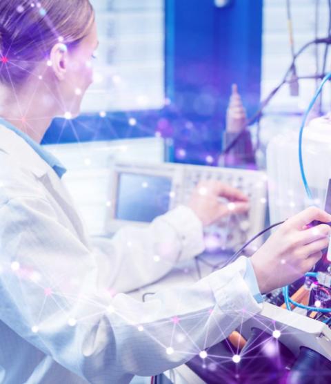 Researcher interacting with machinery