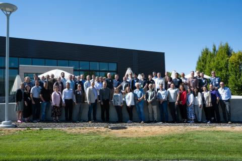Group photo of members and attendees of the MQ workshop