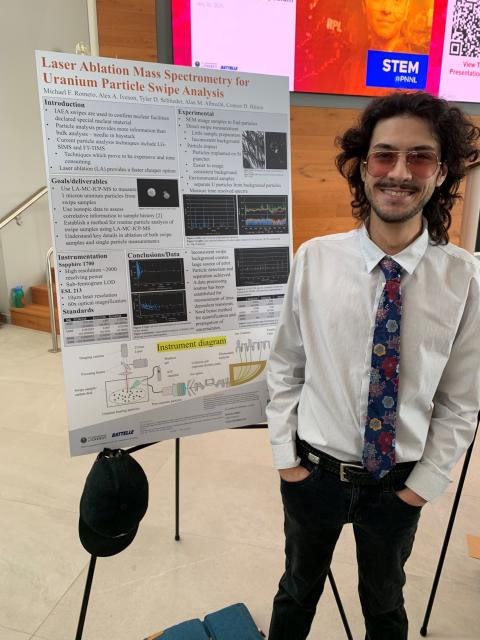 Photo of Michael Romero during the PNNL poster session