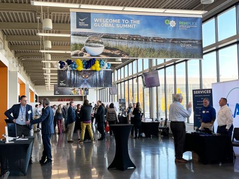 The RemPlex Summit in November 2023 included an expo with sponsor booths in PNNL's Discovery Hall.