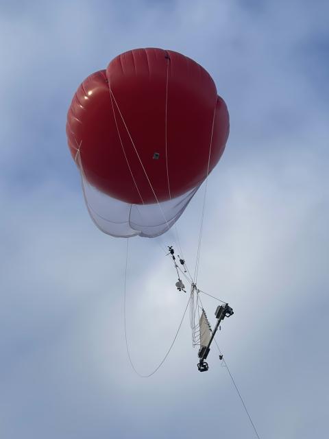 Tethered balloon system for aerial marine wildlife tracking and detection.