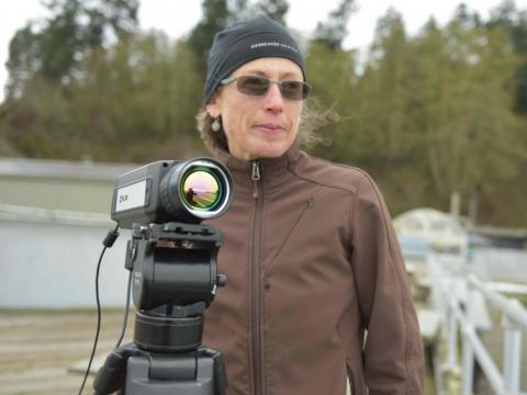 Woman with a camera technology