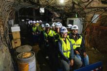 Center for Understanding Subsurface Signals and Permeability (CUSSP) researchers board a mine rail cart headed for the geothermal test bed laboratory on the 4100 Level of the Sanford Underground Research Facility (SURF) in South Dakota. (Photo by Stephen Kenny, Sanford Underground Research Facility).