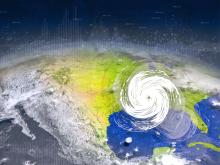 This image depicts North America, showing an illustrated hurricane forming over the Gulf of Mexico.