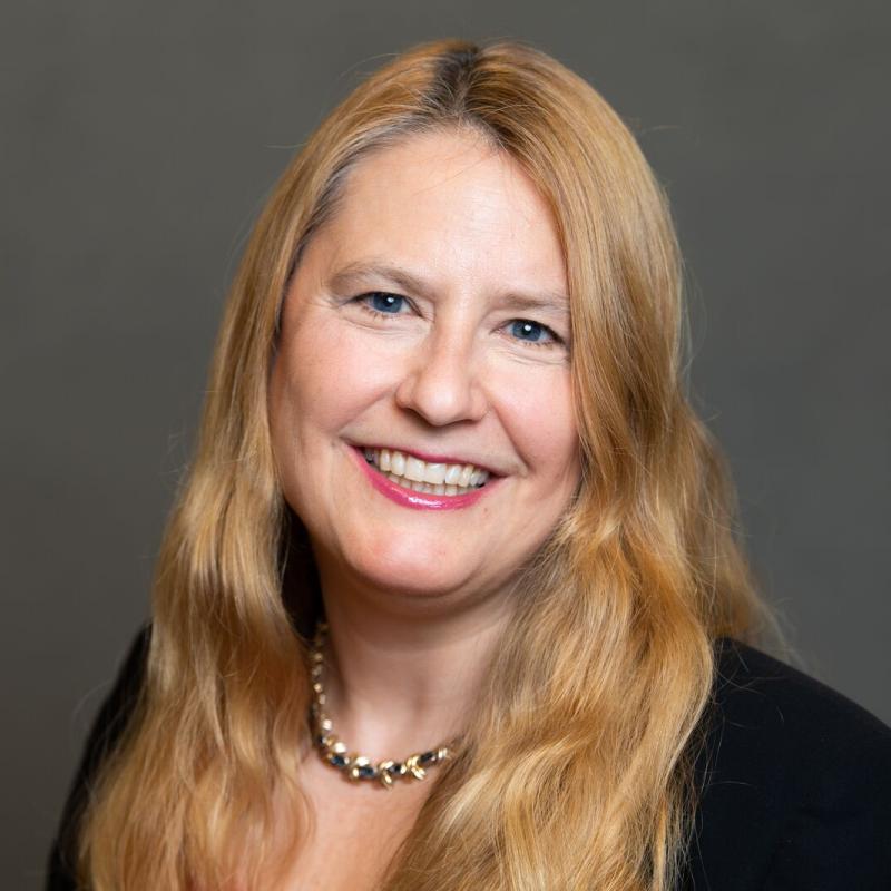 Smiling woman with long hair