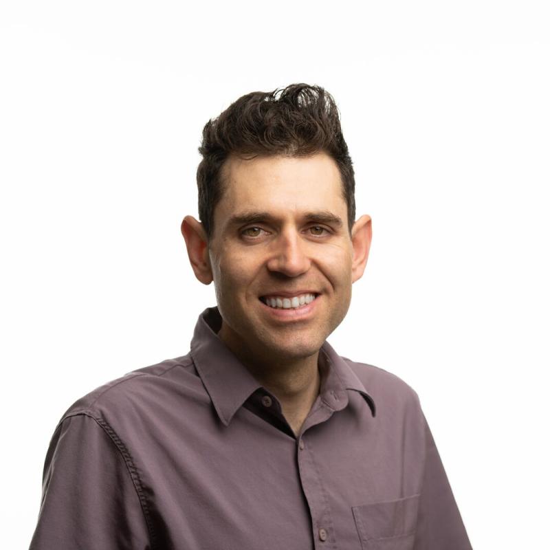 Smiling man with dark hair