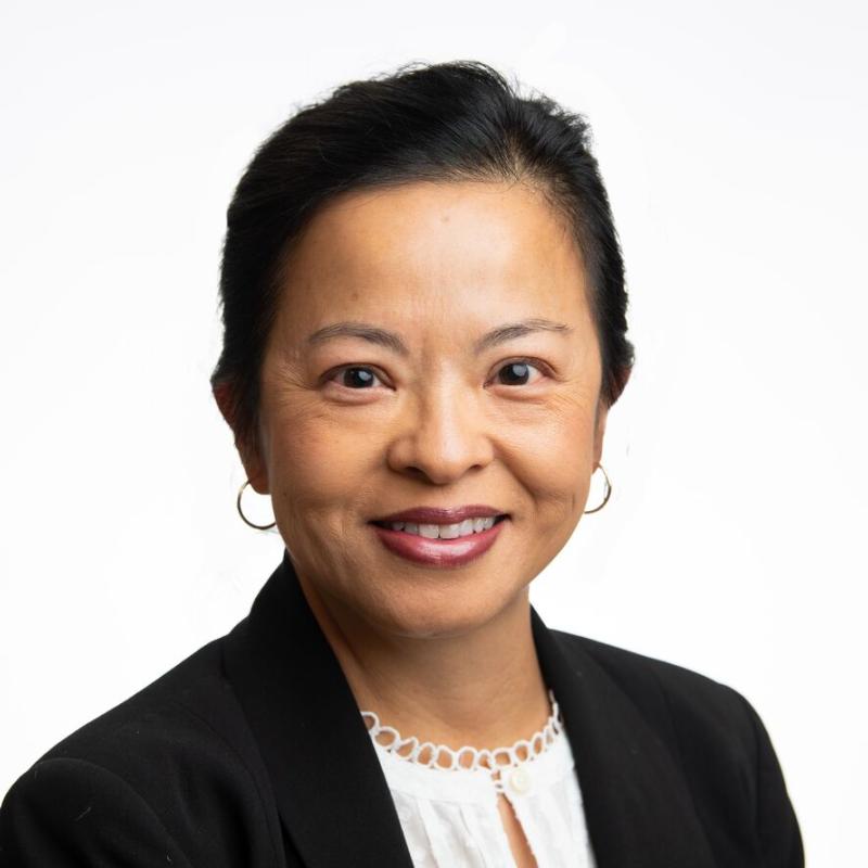 Photo of a smiling female with black hair