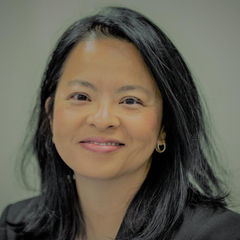 Photo of a smiling female with black hair