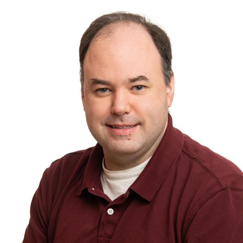 Headshot picture of Andrew Ritzmann with white background