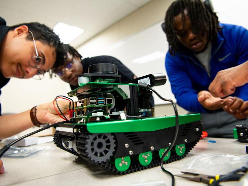 3 MSIPP interns building a robot
