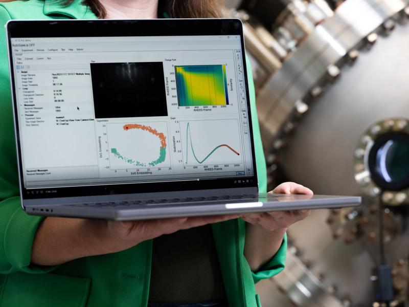 person holding a computer