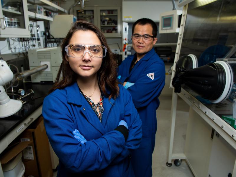 Researchers Cassidy Anderson and Dongping Lu conduct battery research at PNNL's Physical Sciences Laboratory.