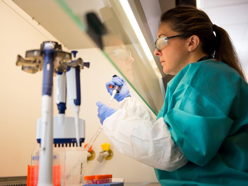 Kristie Oxford in the biodefense lab Thumbnail
