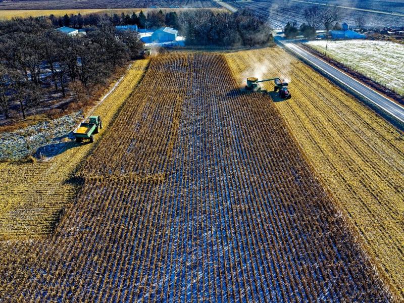 Agricultural machinery in a field of crops