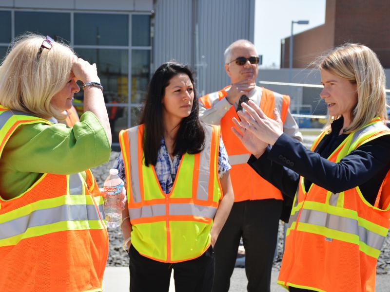 PNNL’s Jamie Hughes (far right) talks about the Radiation Portal Monitoring Program with NNSA Principal Deputy Administrator Madelyn Creedon during a visit in June 2016.