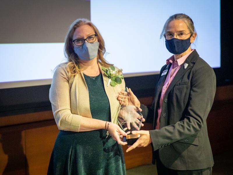 April Carman receiving the UNR College of Science Professional Achievement Award