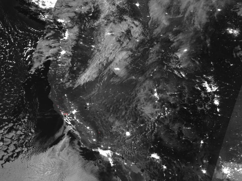 Black and white satellite image of California with some clouds