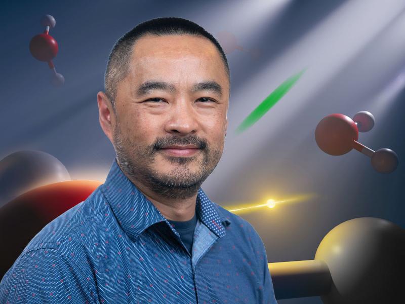 Xiaosong Li is pictured with a background of ultrafast molecules representing some of his research.