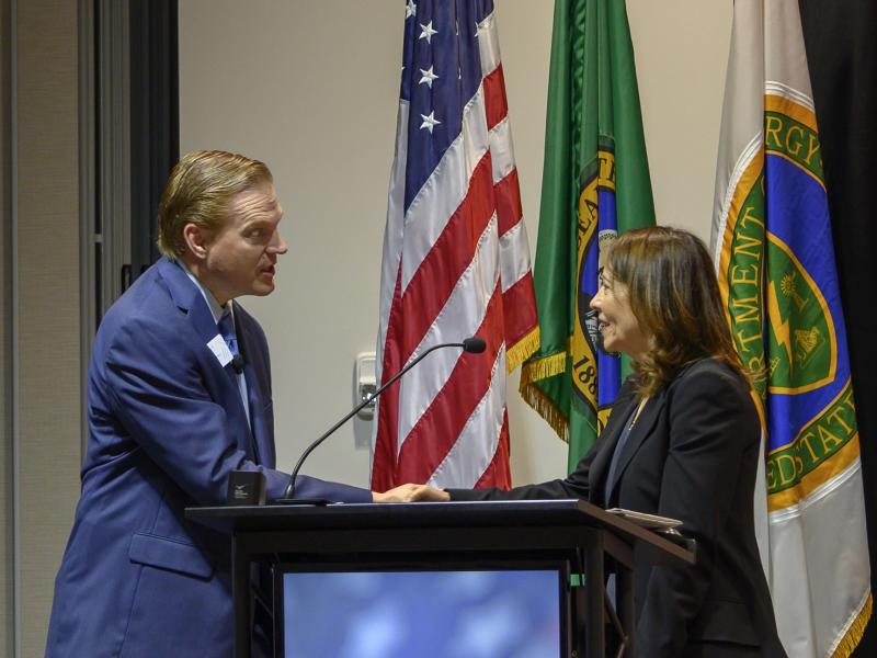 AWB President and CEO Kris Johnson shaking hands with U.S. Senator Maria Cantwell