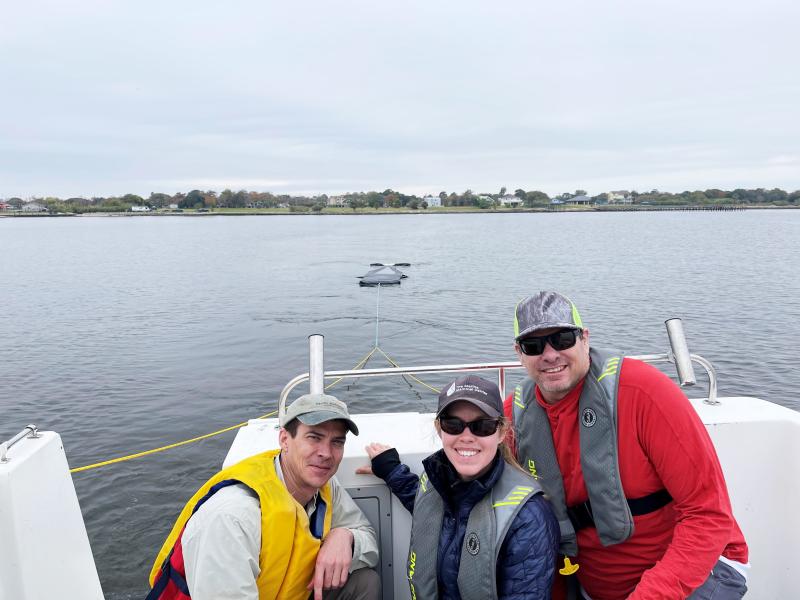 Triton team with big smiles after successfully towing Large Marge from the University of Houston research vessel.