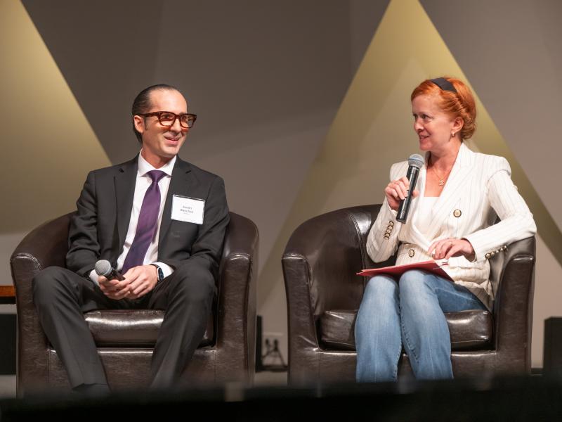 Pacific Northwest National Laboratory Chief Commercialization Officer Christina Lomasney asks questions to Battelle Tech Fellow Justin Sanchez at the National Academies of Sciences, Engineering, and Medicine’s Government-University-Industry-Philanthropy Research Roundtable. 