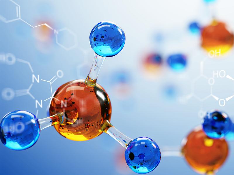 photo of orange spheres connected to blue spheres like molecule