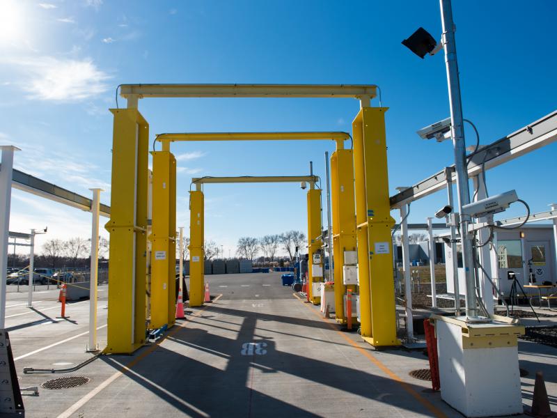 Yellow scaffolding to test a radiation portal monitoring station