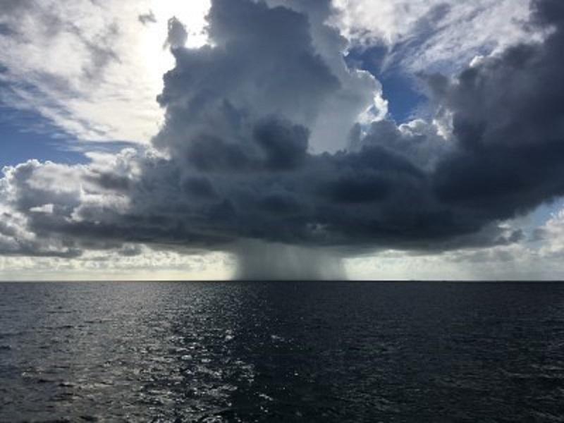 Rain shaft over ocean