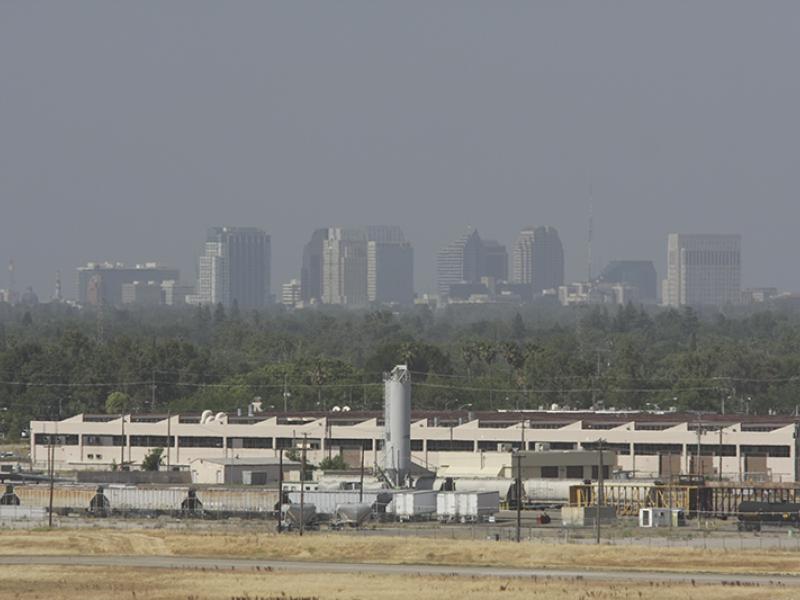 Haze obscures the Sacramento skyline