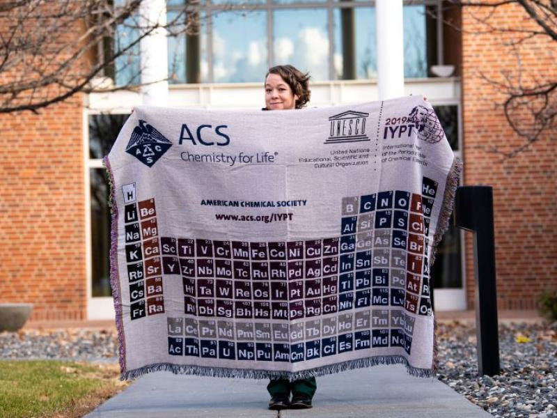 Palazzo holding a blanket showing the periodic table of the elements
