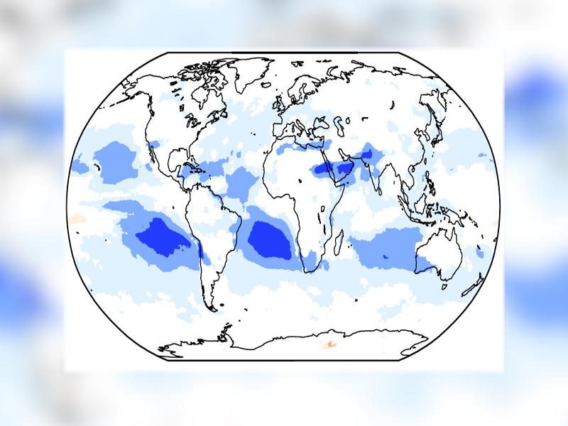 Map with dark blue spots over several oceans representing modeled decreases in cloud cover