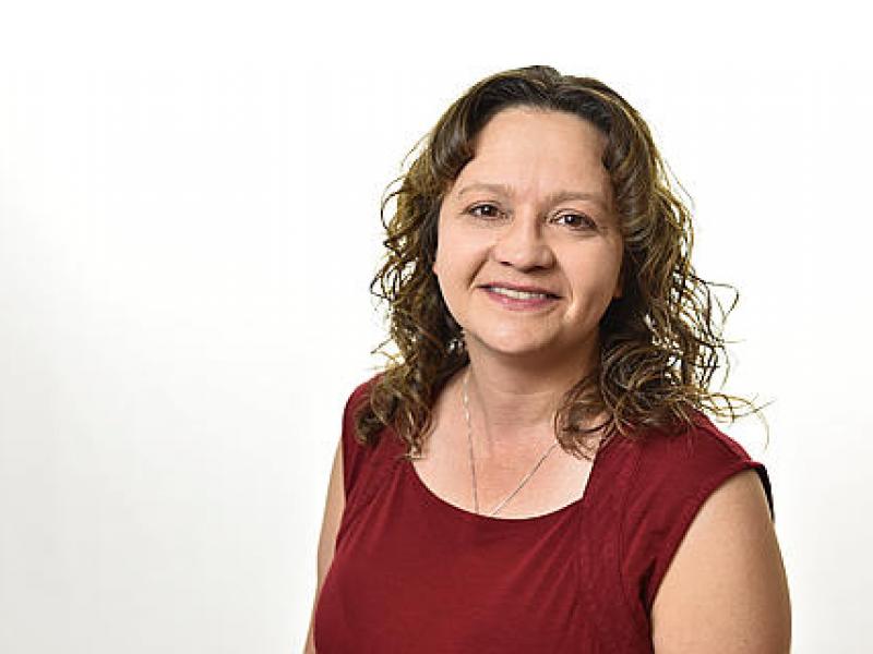 portrait of a woman wearing a red shirt