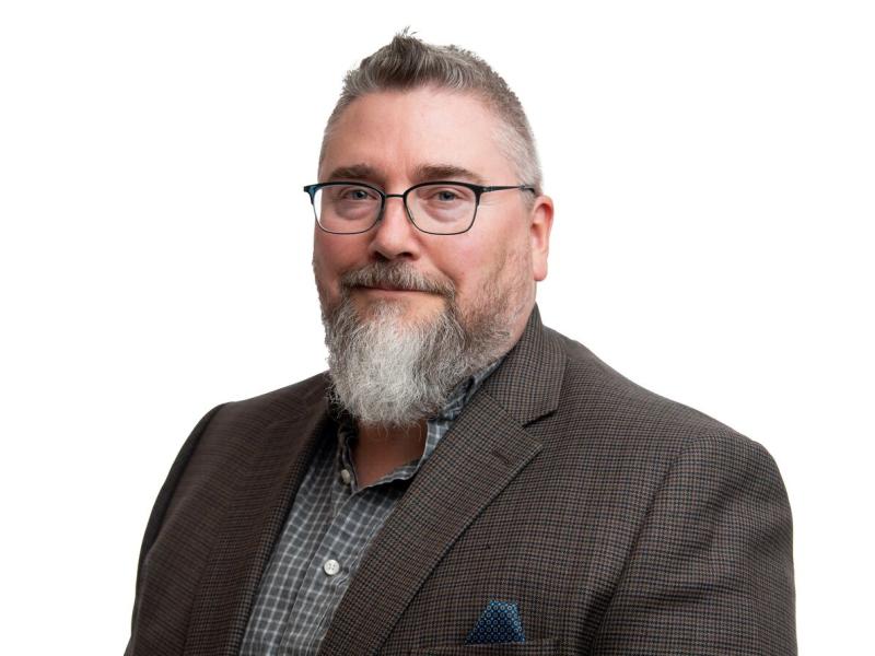 Portrait of Michael Henson, senior cybersecurity scientist