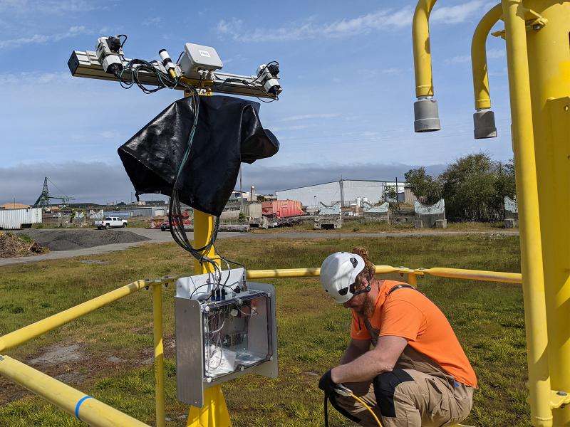 equipment being installed on a buoy