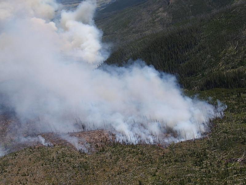 an aerial photo of an active wildfire