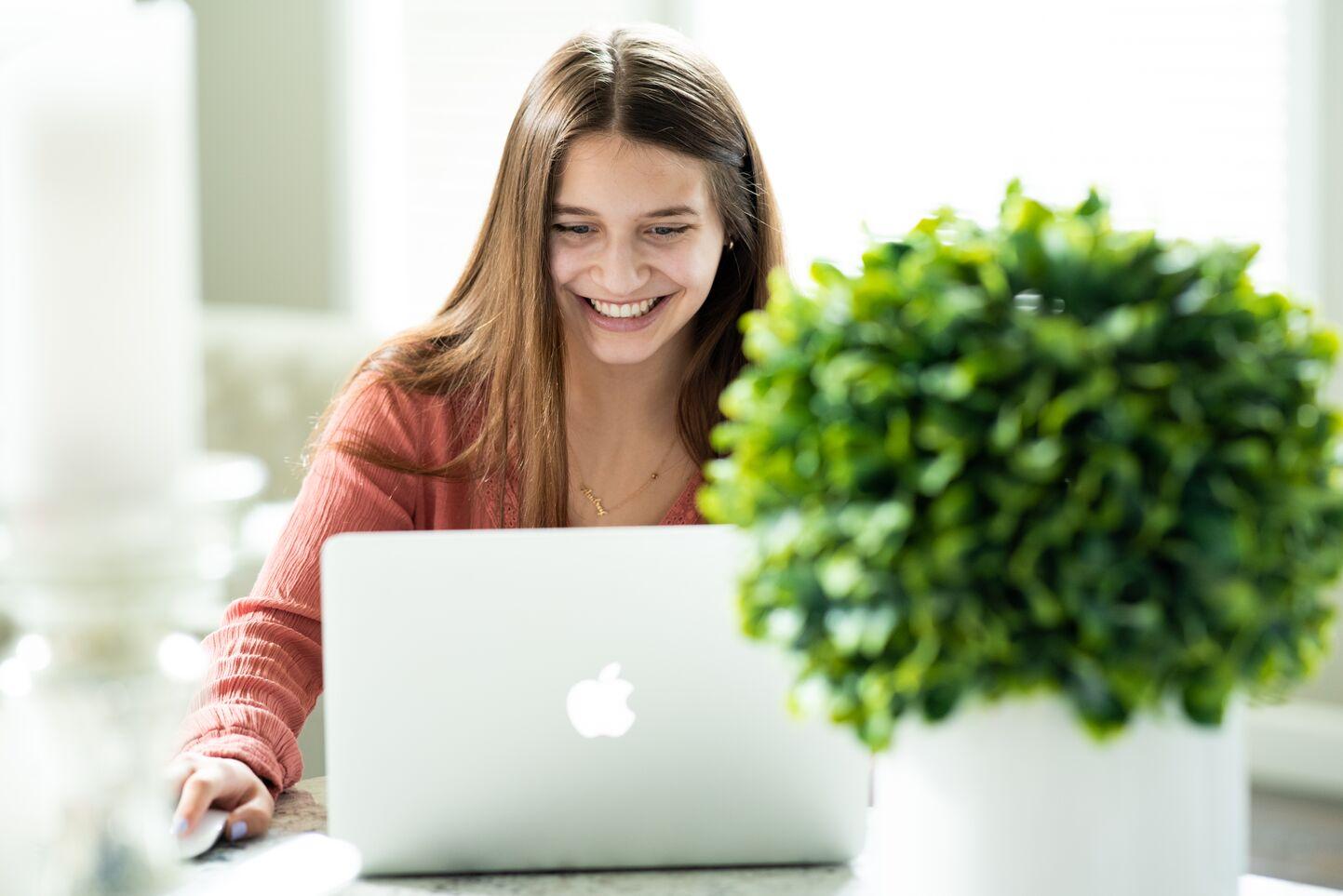 Girl working on a laptop computer
